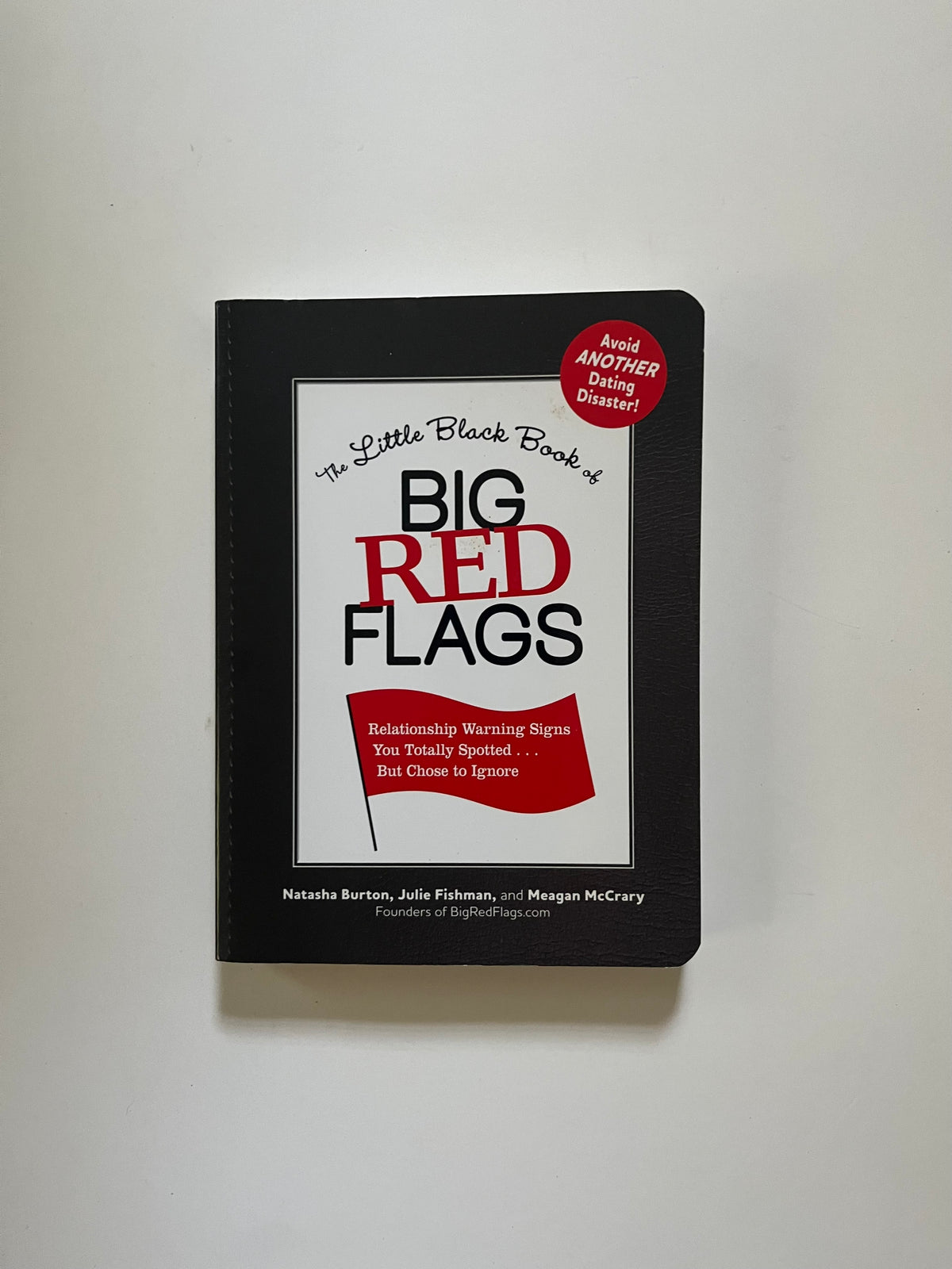 The Little Black Book of Big Red Flags: Relationship Warning Signs You Totally Spotted... Bot Chose to Ignore by Natasha Burton, Julie Fishman, and Meagan McCrary