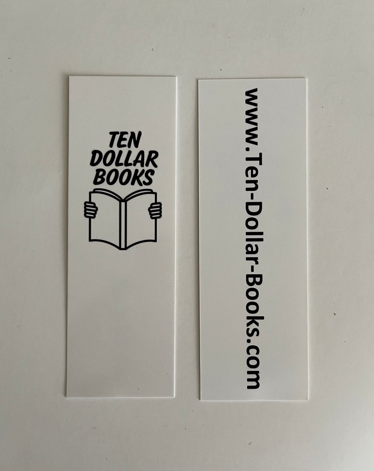 Bookmarks with the logo by Gabe Ribeiro